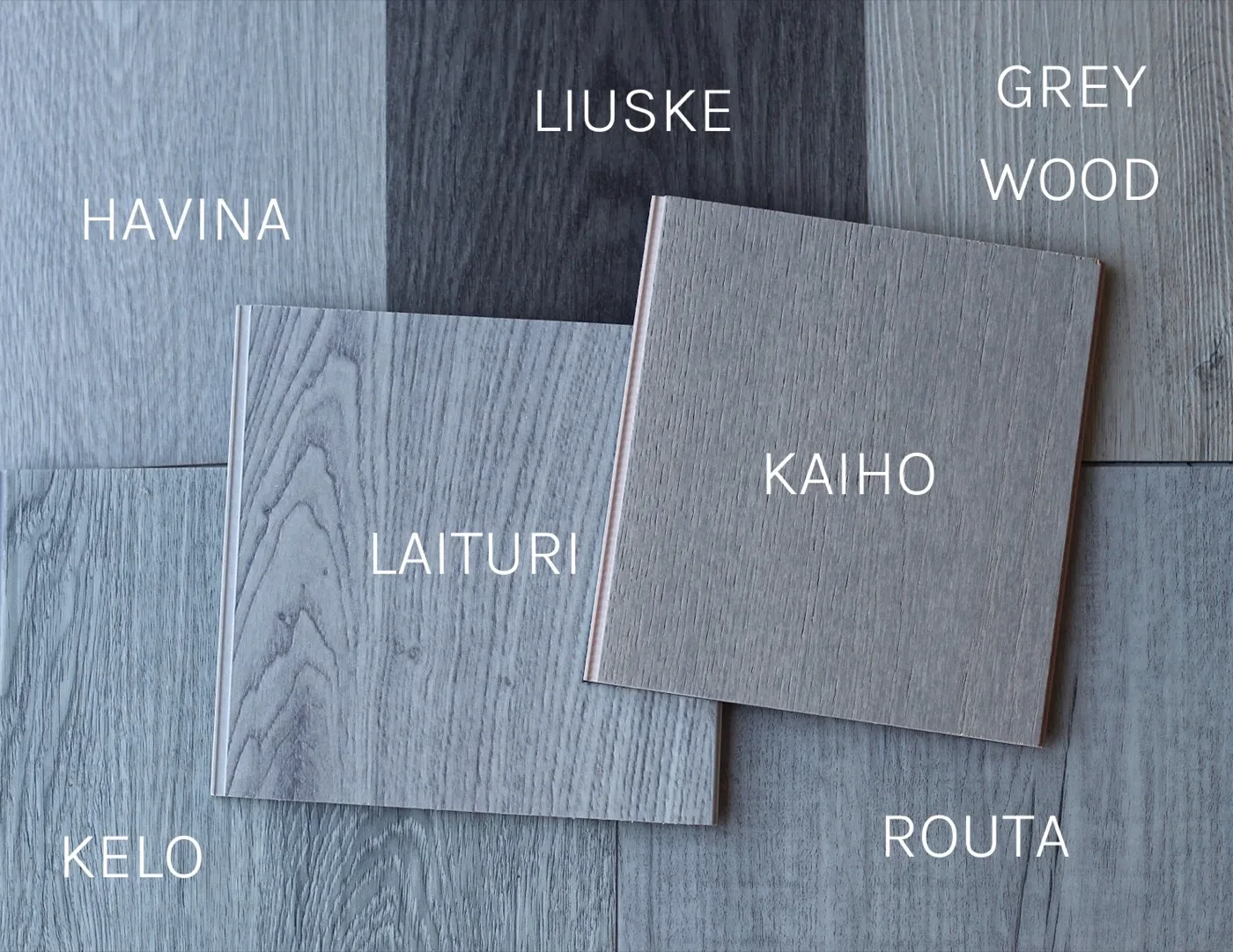 Harmaiden lattiamallien sävyerot lähikuvassa: Kelo, Havina, Laituri, Liuske, Routa, Grey Wood ja Kaiho
